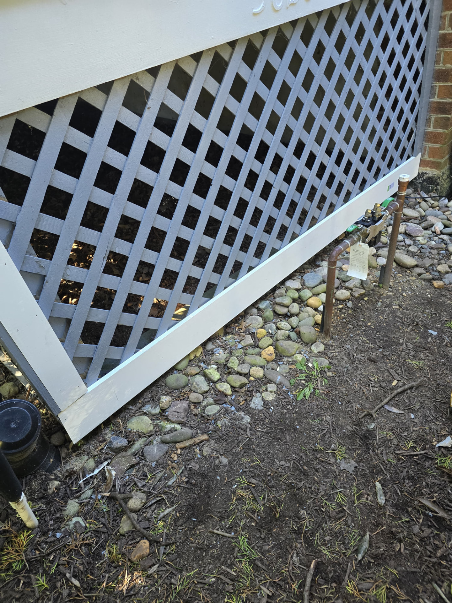 After — Front porch — rotted steps and skirting rebuilt, lattice replaced