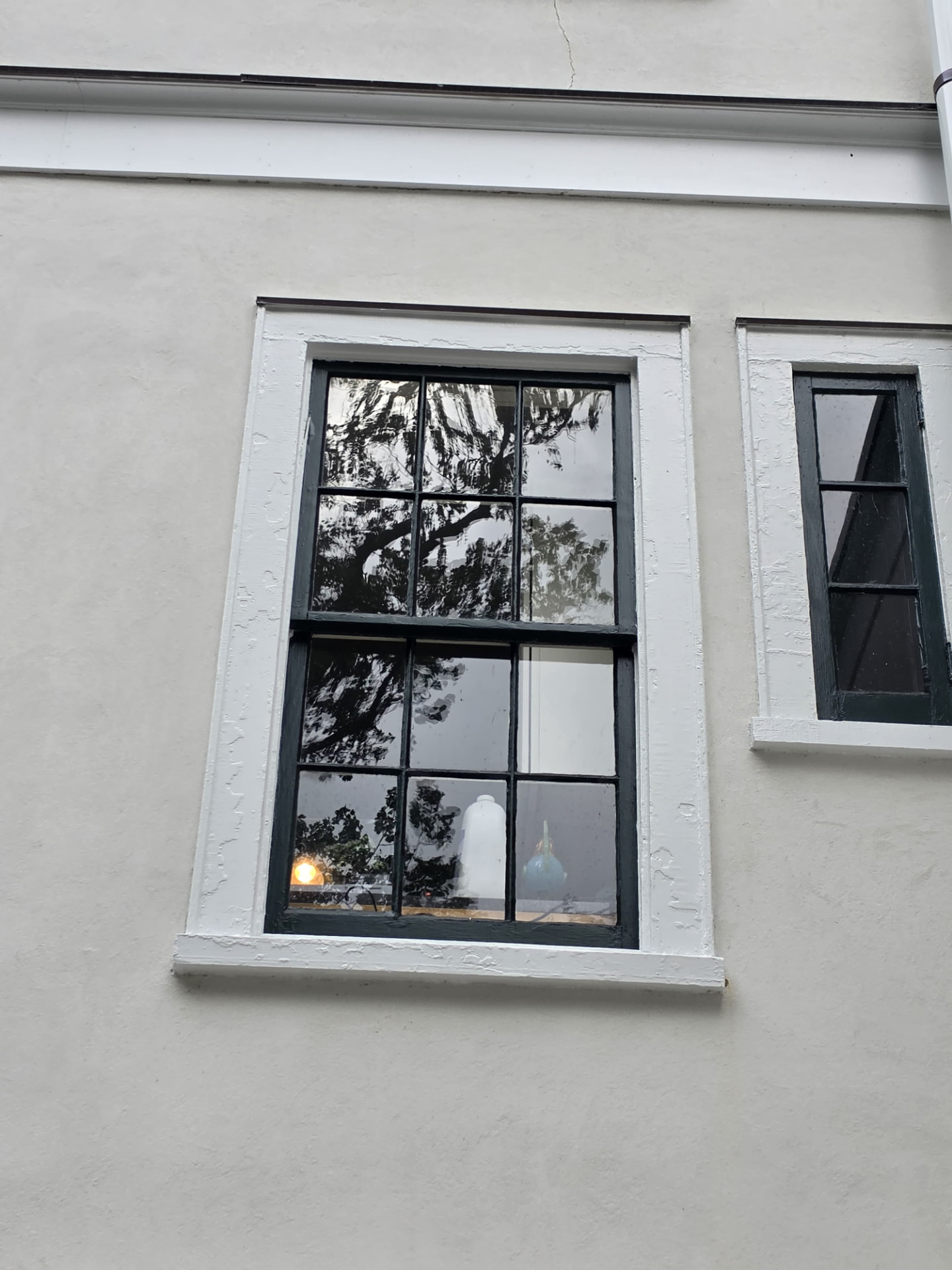 Exterior sash and stucco touch-up — Real AJN Handyman LLC project