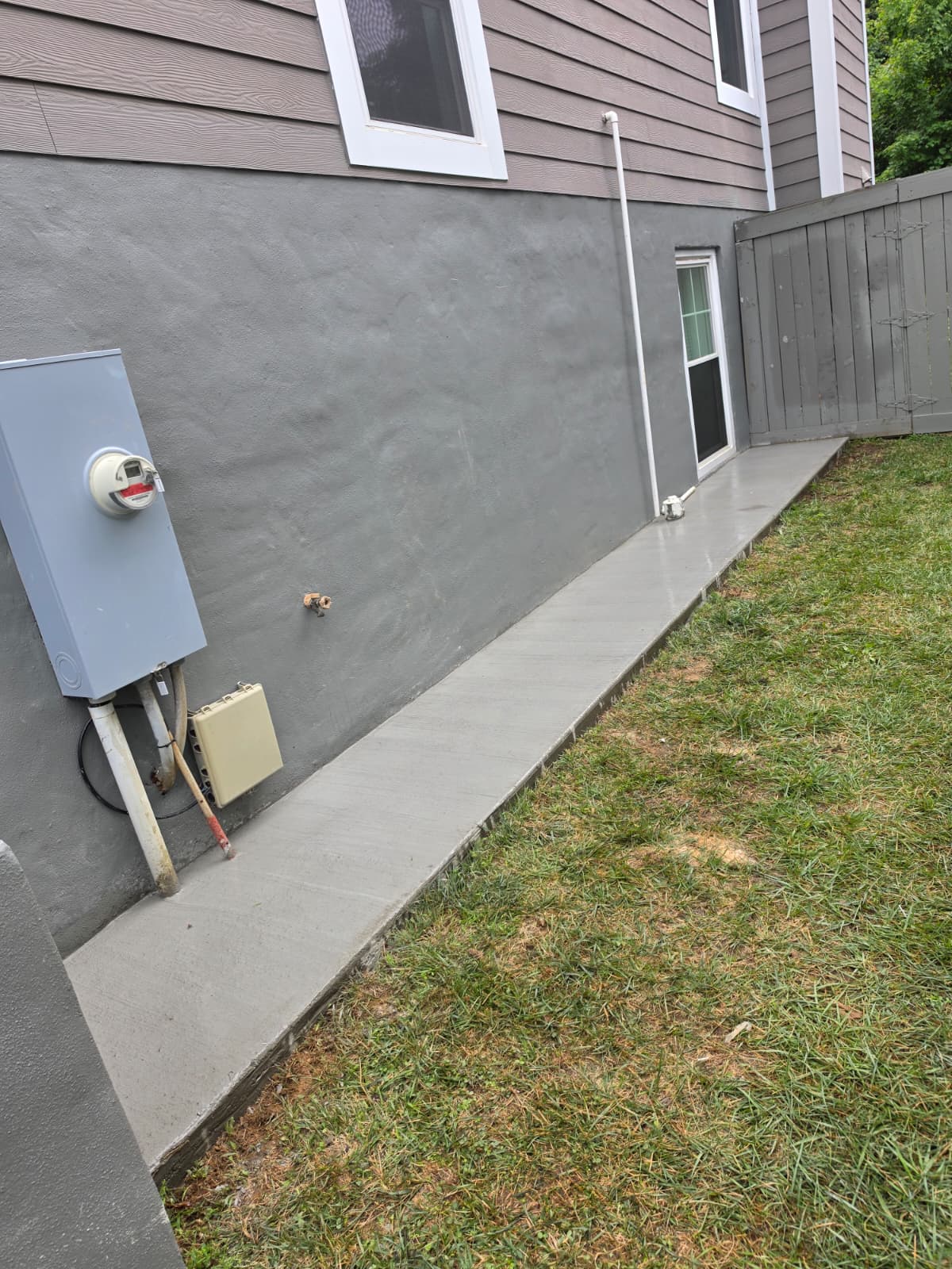 After — Side walkway — forms and reinforcement set, concrete poured and finished