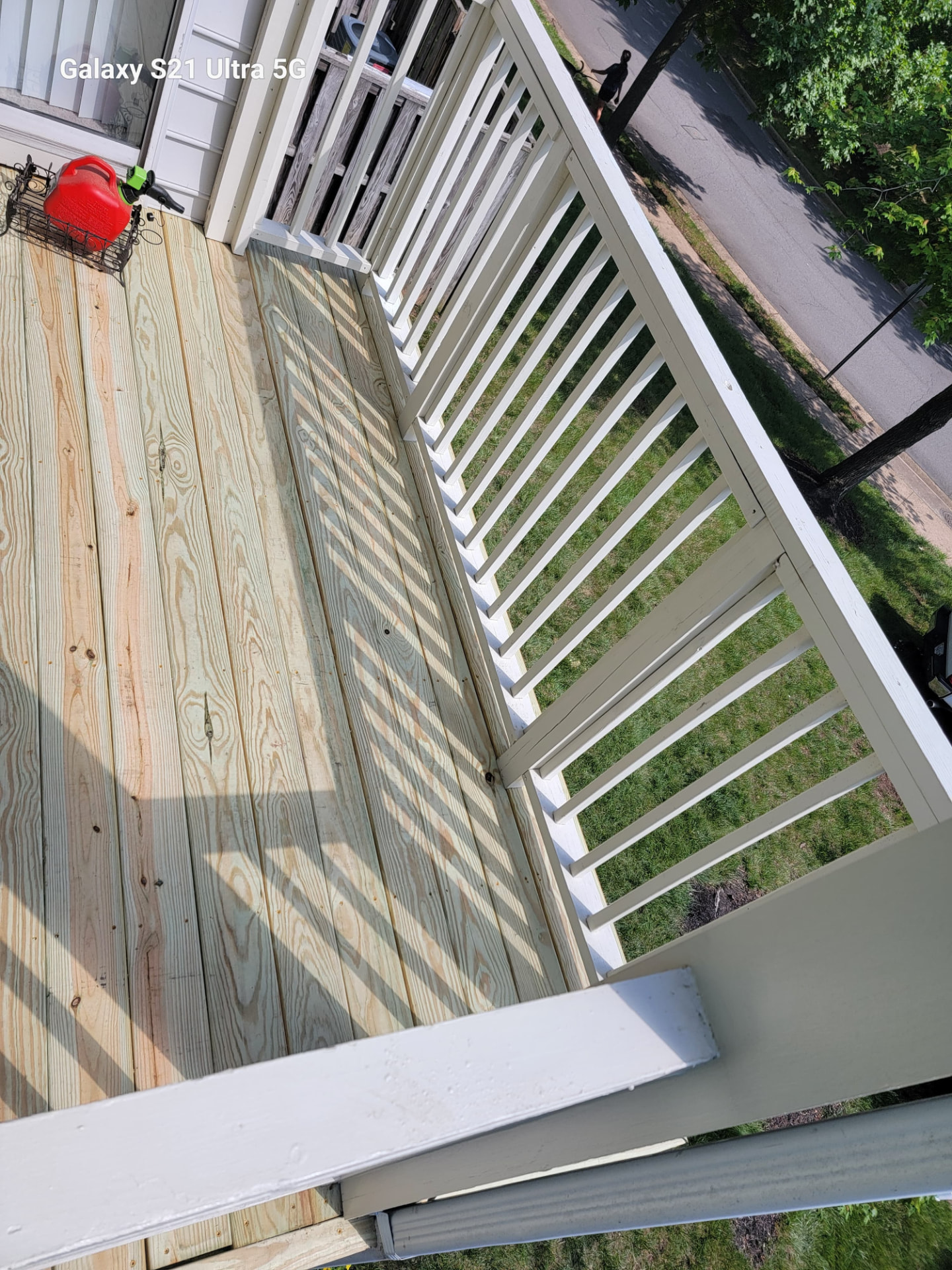 After — Deck rebuild — new pressure-treated decking